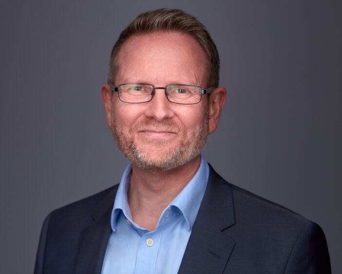 Chris Woolley's Journey in Engineering and Vision for the EV Future